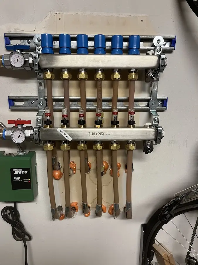 Plumber performing Water Heater Repair at a residential property in Bay Harbor Islands